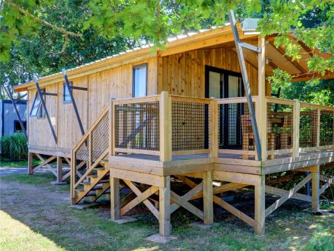 TENTE TOILE ET BOIS 5 personnes - Cabane Lodge sur Pilotis - 2 chambres : 32 m² + terrasse 11 m² couverte