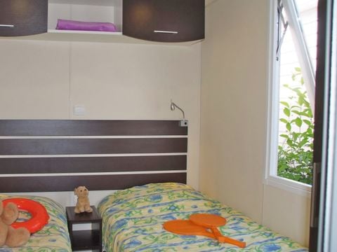 MOBILHOME 4 personnes - Confort TV Clim - 2 chambres - 4 personnes