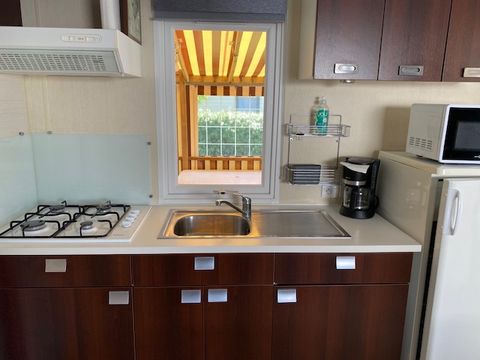 MOBILE HOME 6 people - 3 bedrooms - covered terrace - TV -