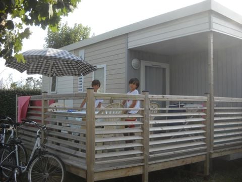 MOBILE HOME 4 people - Comfort 25m² (2 bedrooms) + covered terrace 10m² + TV 4 pers.