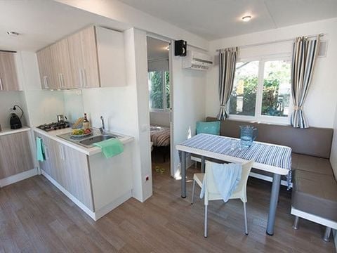 MOBILHOME 4 personnes - Mobil-home | Comfort XL | 2 Ch. | 4 Pers. | Terrasse surélevée | 2 SDB | Clim.