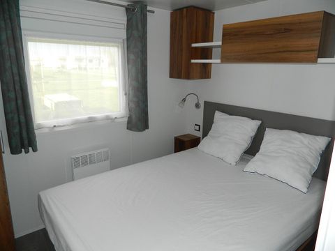 MOBILHOME 6 personnes - PREMIUM 38m² (2 chambres) + Terrasse - vue mer + Accès vélo maritime