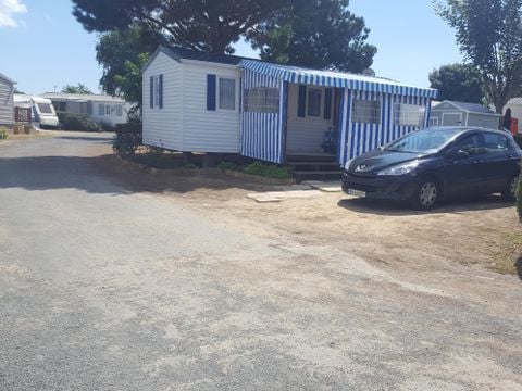 MOBILE HOME 6 people - 3 standard bedrooms (mobile homes over 12 years old) 30m² covered terrace