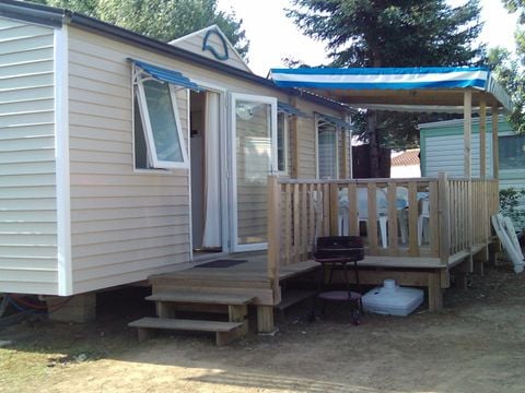 MOBILE HOME 6 people - 3 standard bedrooms (mobile homes over 12 years old) 30m² covered terrace