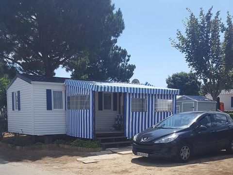 MOBILHOME 6 personnes - 3 chambres standard (mobil-home de + 12 ans) terrasse couverte 30m²