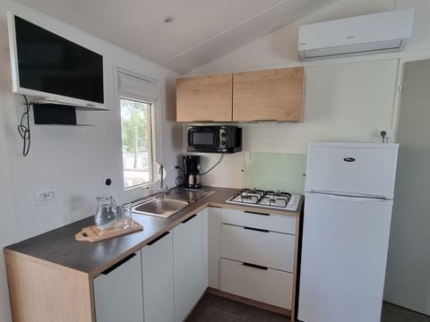 MOBILE HOME 4 people - 2 BEDROOM COMFORT mobile home 7.5mx4m (28-30m2) + semi-covered terrace + air conditioning + television