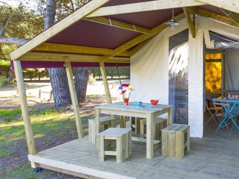 CANVAS AND WOOD TENT 4 people - Freeflower Confort 28m² ( 2 bedrooms) + covered terrace 8m²- without sanitary facilities and without bathroom 4 pers.