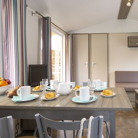 Mobilheim 5 Personen - Premium 28m² - 2 Schlafzimmer - überdachte Terrasse - TV + Geschirrspüler + Bettwäsche + Handtücher