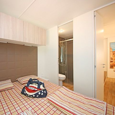 CASA MOBILE 6 persone - Casa mobile | Comfort XL | 3 camere da letto | 6 persone | Terrazza coperta | 2 bagni | Aria condizionata.