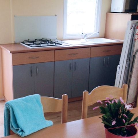 MOBILHOME 4 personnes - Mobile-Home 30m² - Standard - 2 chambres - terrasse semi-couverte - TV - Clim 4 pers. 