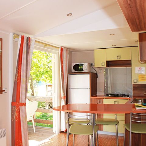 MOBILHOME 4 personnes - Mobile-Home 30m² - Standard - 2 chambres - terrasse semi-couverte - TV - Clim 4 pers. 