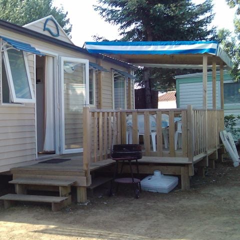 MOBILHOME 6 personnes - 3 chambres standard (mobil-home de + 12 ans) terrasse couverte 30m²