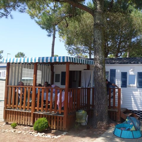 MOBILHOME 6 personnes - 3 chambres standard (mobil-home de + 12 ans) terrasse couverte 30m²