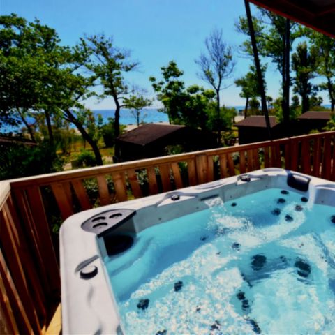 LODGE 9 personnes - Lodge Prestige sur pilotis front mer 7p 3Ch SPA