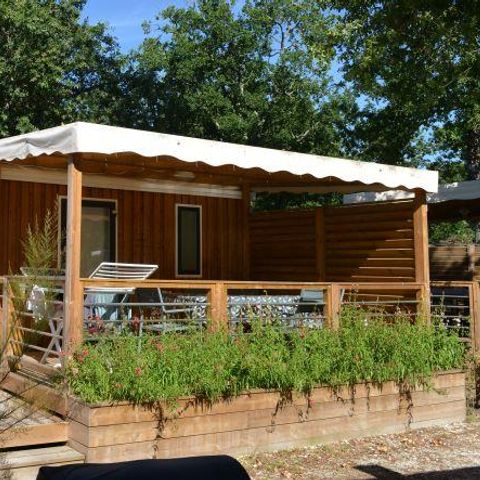 Stacaravan 5 personen - PREMIUM Hout 28m² - 2 kamers + overdekt terras + TV + LV +BBQ + SOLARIUM